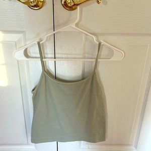 Green Brandy Melville tanktop size small worn once, in good condition.